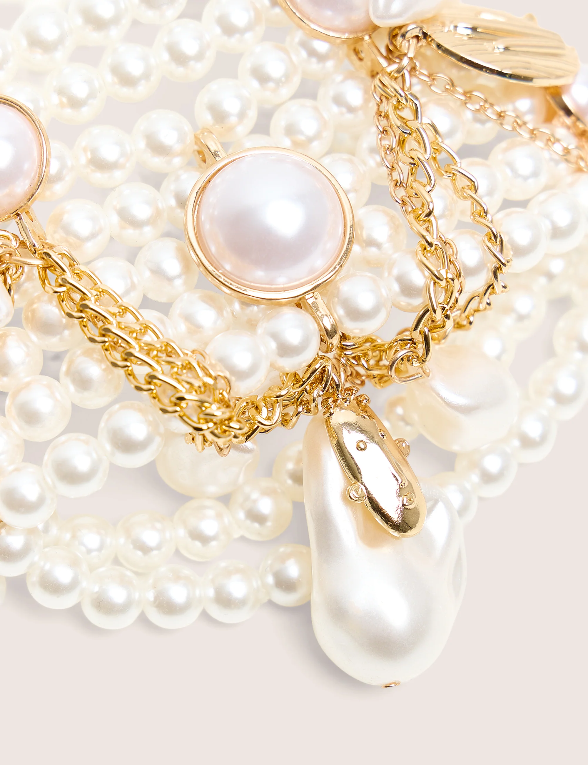Layered Pearl Bracelet With Gold Charms - Image 3